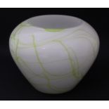 A glass vase with green marbled detail. Approx. 7 1/2" high Please Note - we do not make reference