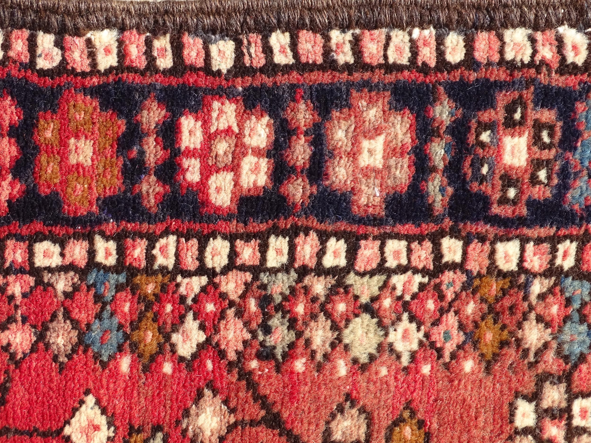 Carpet / Rug : A North West Persian Heriz runner with red ground having central medallions with - Image 6 of 8