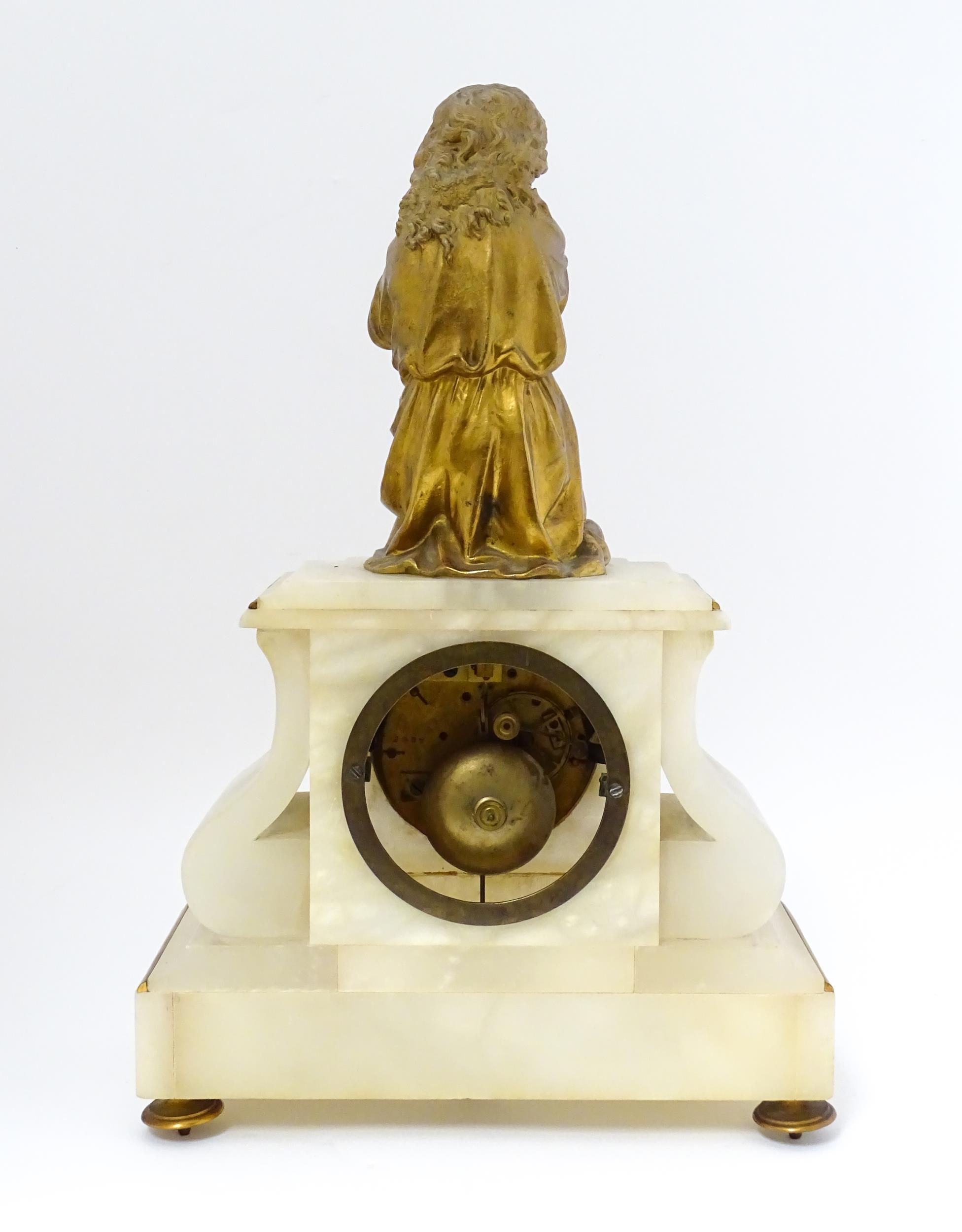 A French Japy Freres mantle clock, the alabaster base with gilt Roman Numerals, surmounted by a cast - Image 8 of 9