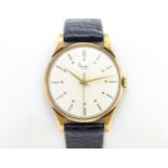 A 9ct gold gentlemans wristwatch, the dial signed Asprey, the case hallmarked Edinburgh c. 1956.