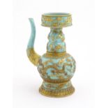 A Chinese wine ewer with funnel cover, the turquoise ground decorated with gilt dragons and bats