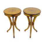 A pair of 20thC lamp tables with penwork and painted decoration with carved floral mouldings and