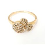 A 9ct rose gold ring set with a profusion of Argyle diamonds. Ring size approx. N Please Note - we