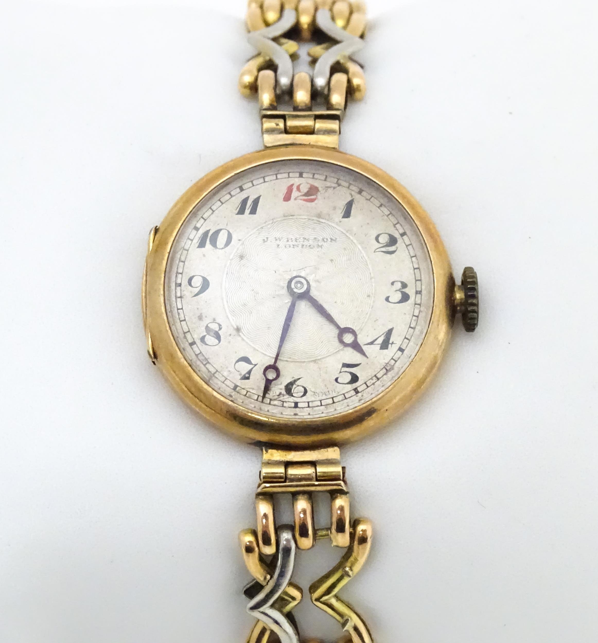A c.1925 9ct gold cast ladies wristwatch, the dial with engraved decoration, Arabic numerals and - Image 5 of 11