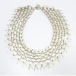 A Persian / Indian style white metal necklace / chocker collar formed of discs with script and