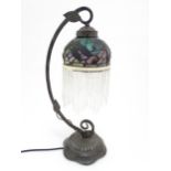 A Tiffany style table lamp with dragon fly detail to shade. The whole approx 19" high Please