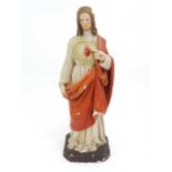A 20thC plaster cast sculpture depicting Christ of The Sacred Heart / the Most Sacred Heart of