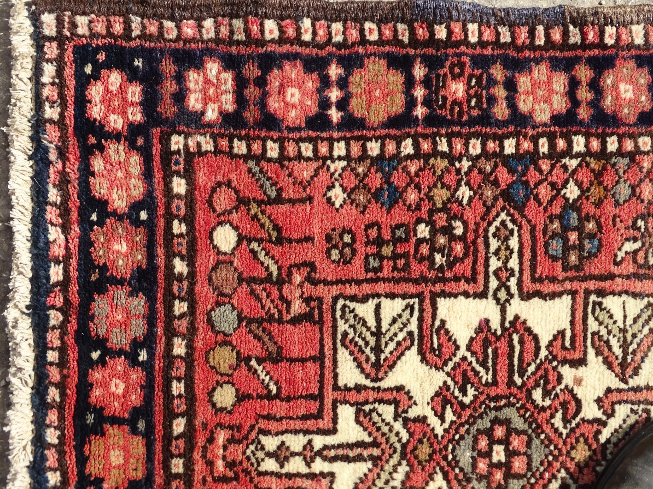 Carpet / Rug : A North West Persian Heriz runner with red ground having central medallions with - Image 5 of 8