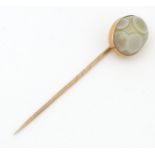 A yellow metal stick pin with agate hardstone cabochon. Approx 2 3/4" long Please Note - we do not