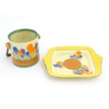 A Clarice Cliff sandwich plate decorated in the Crocus pattern. Together with a Clarice Cliff