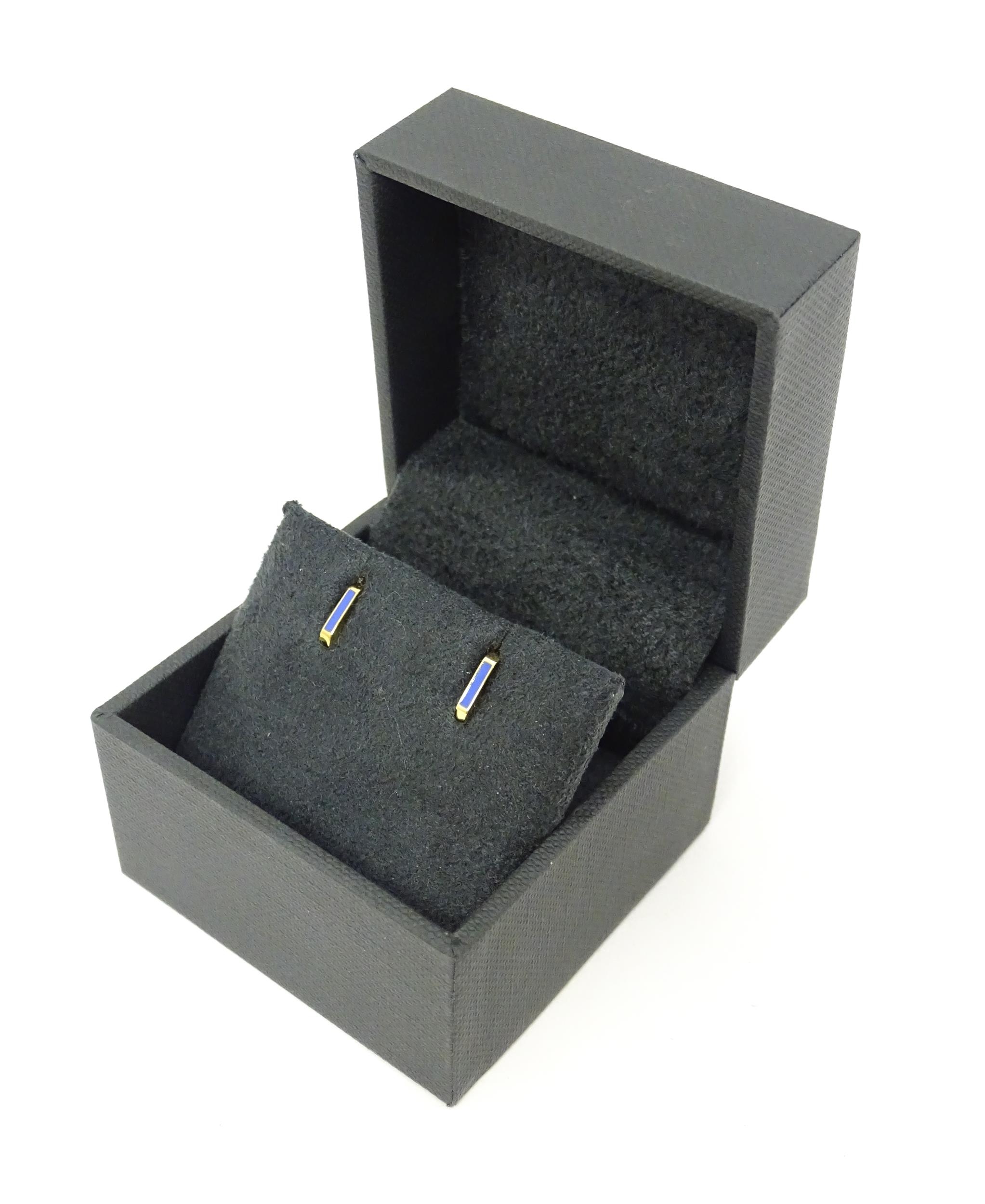 A pair of Astley Clarke 925 silver gilt stud earrings with blue enamel detail. Approx. 1/4" wide - Image 2 of 8