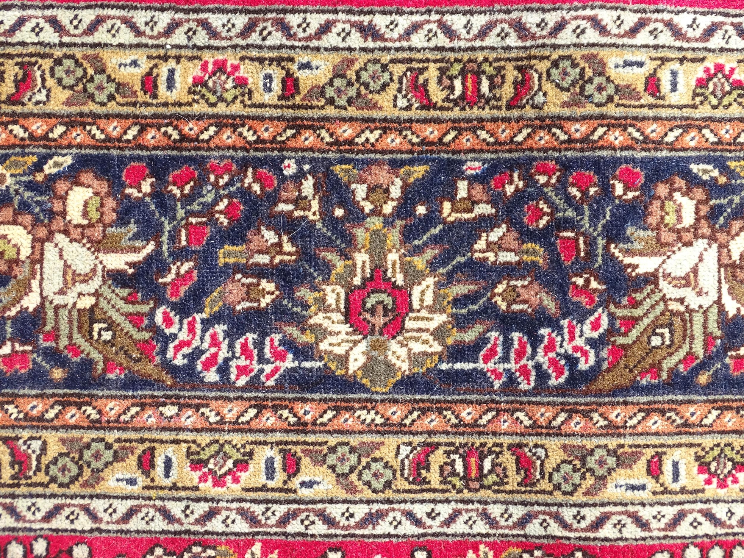 Carpet / Rug : A North West Persian Tabriz carpet, the red ground with central medallion of floral - Image 5 of 6