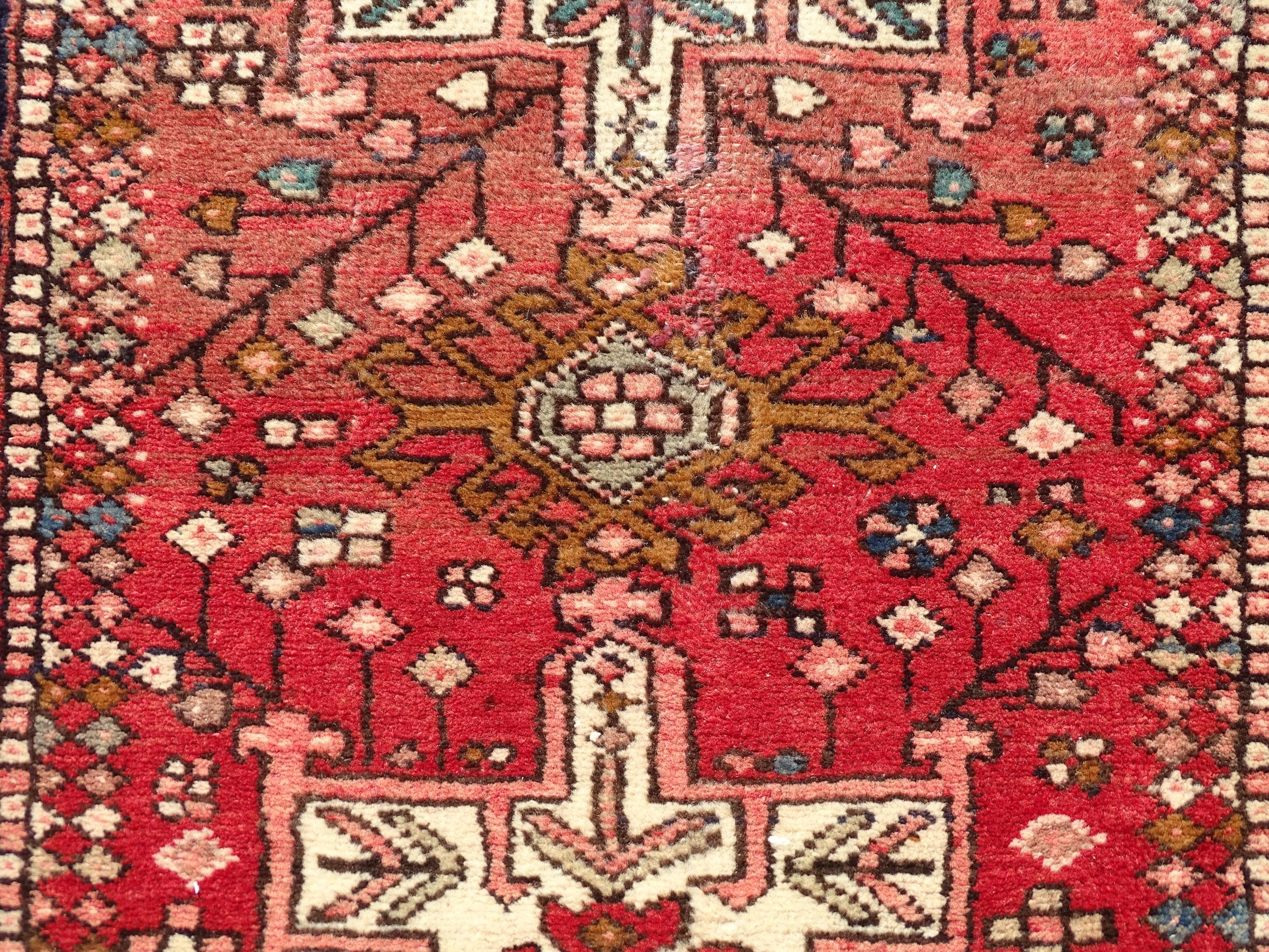 Carpet / Rug : A North West Persian Heriz runner with red ground having central medallions with - Image 3 of 8