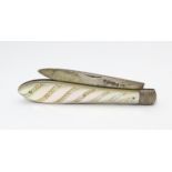 A Victorian silver folding fruit knife with mother of pearl handle hallmarked Sheffield 1864 maker