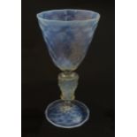 A Venetian glass goblet / pedestal drinking glass with vaseline detail. Approx 6 3/4" high Please