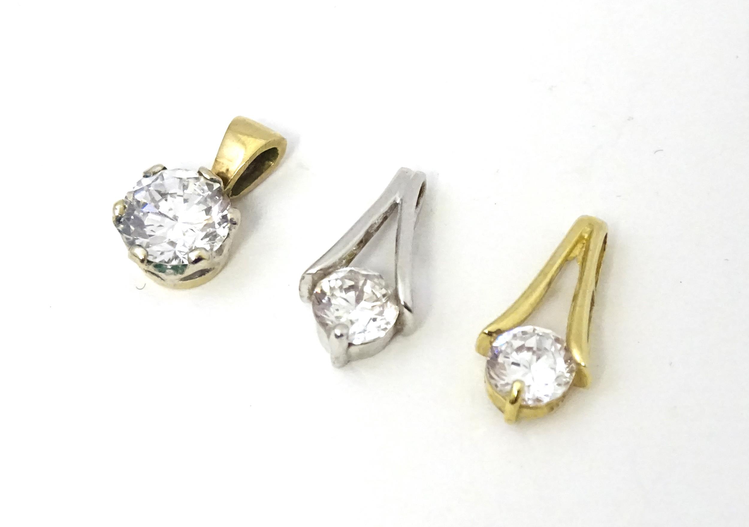 Three 9ct gold pendants set with cubic zirconia. To include a white gold example. Approx 1/2" - Image 3 of 7