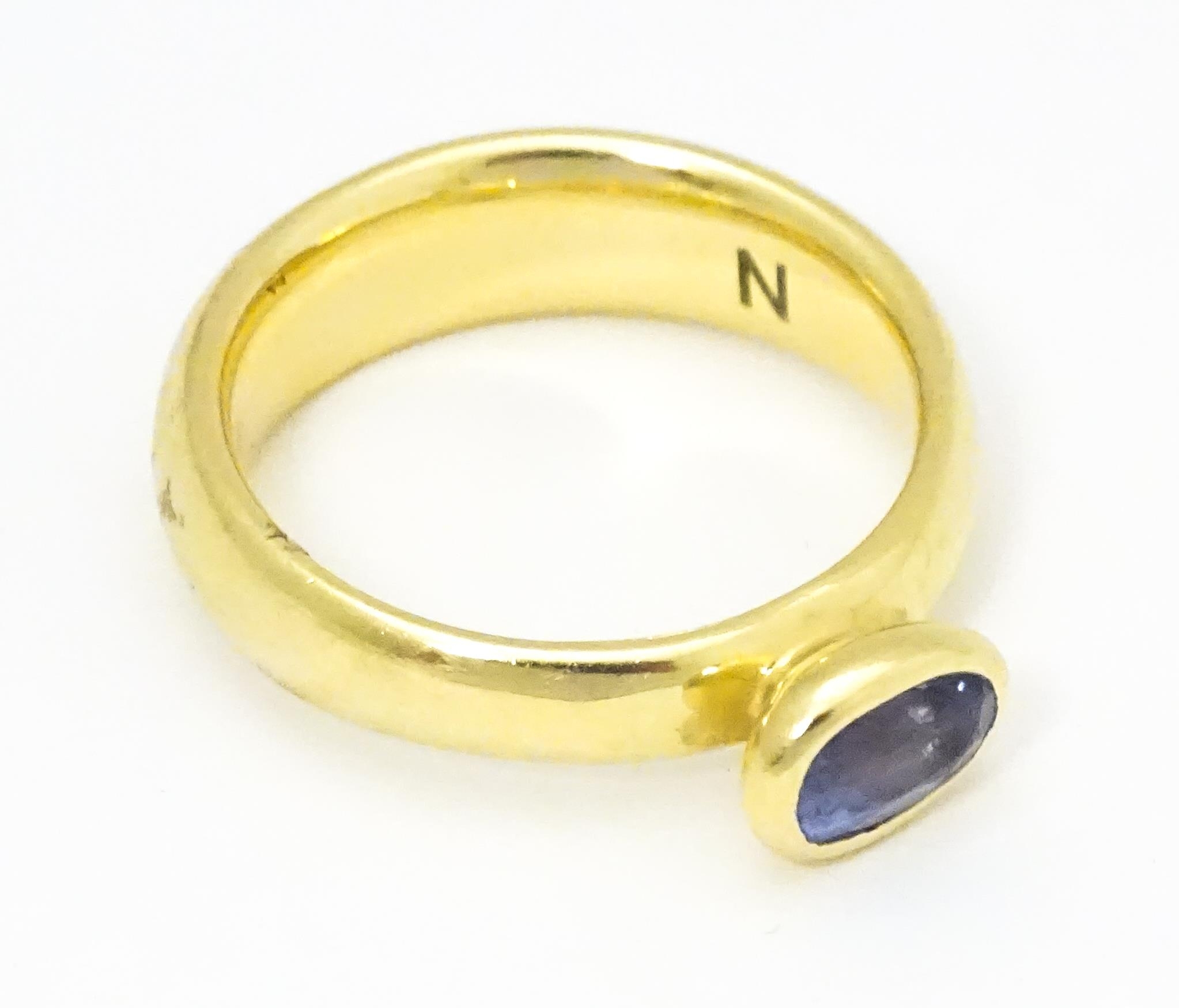 An 18ct gold ring set with oval tanzanite, maker Links of London. Ring size approx M Please Note - - Image 2 of 7