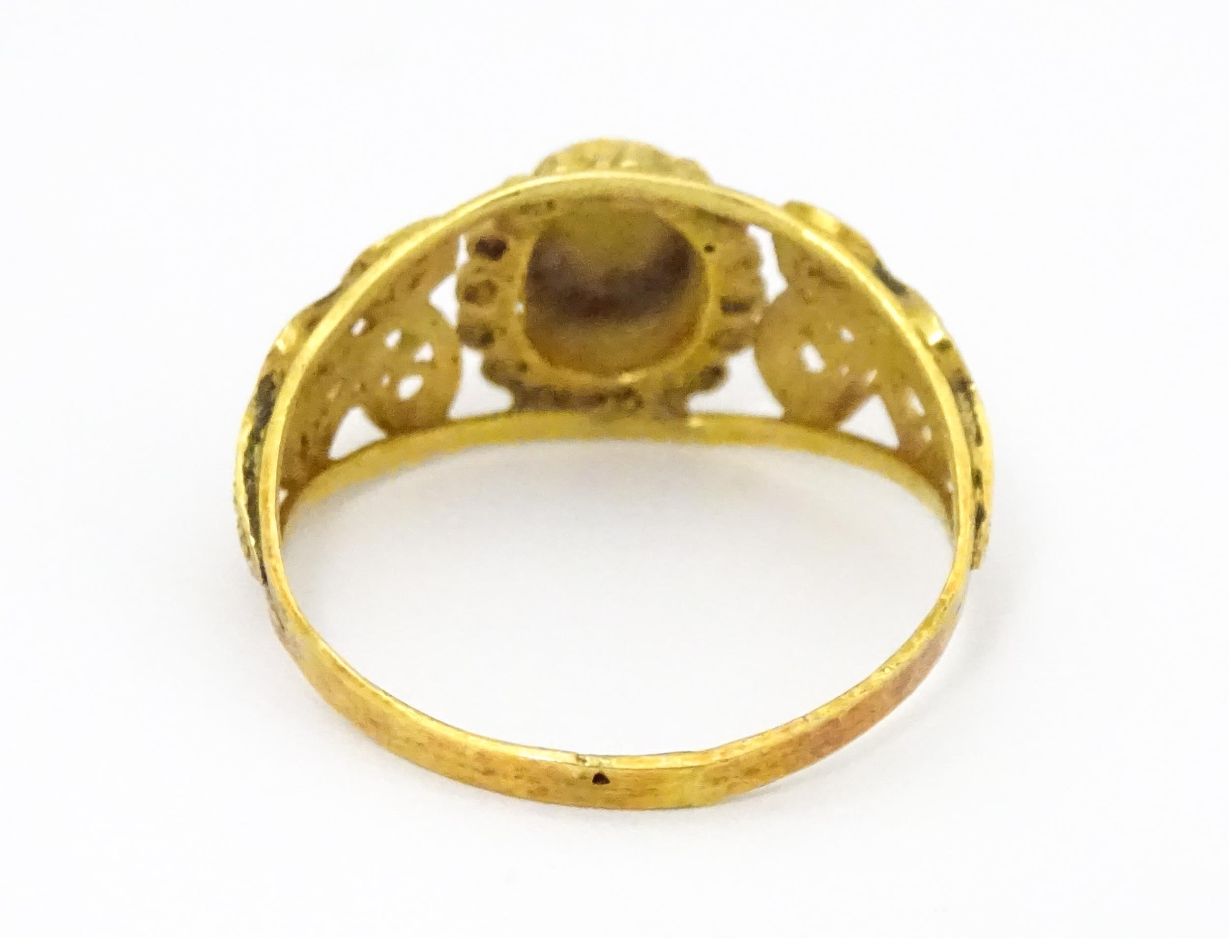 A yellow metal ring with filigree decoration. Ring size approx. K 1/2 Please Note - we do not make - Image 5 of 7