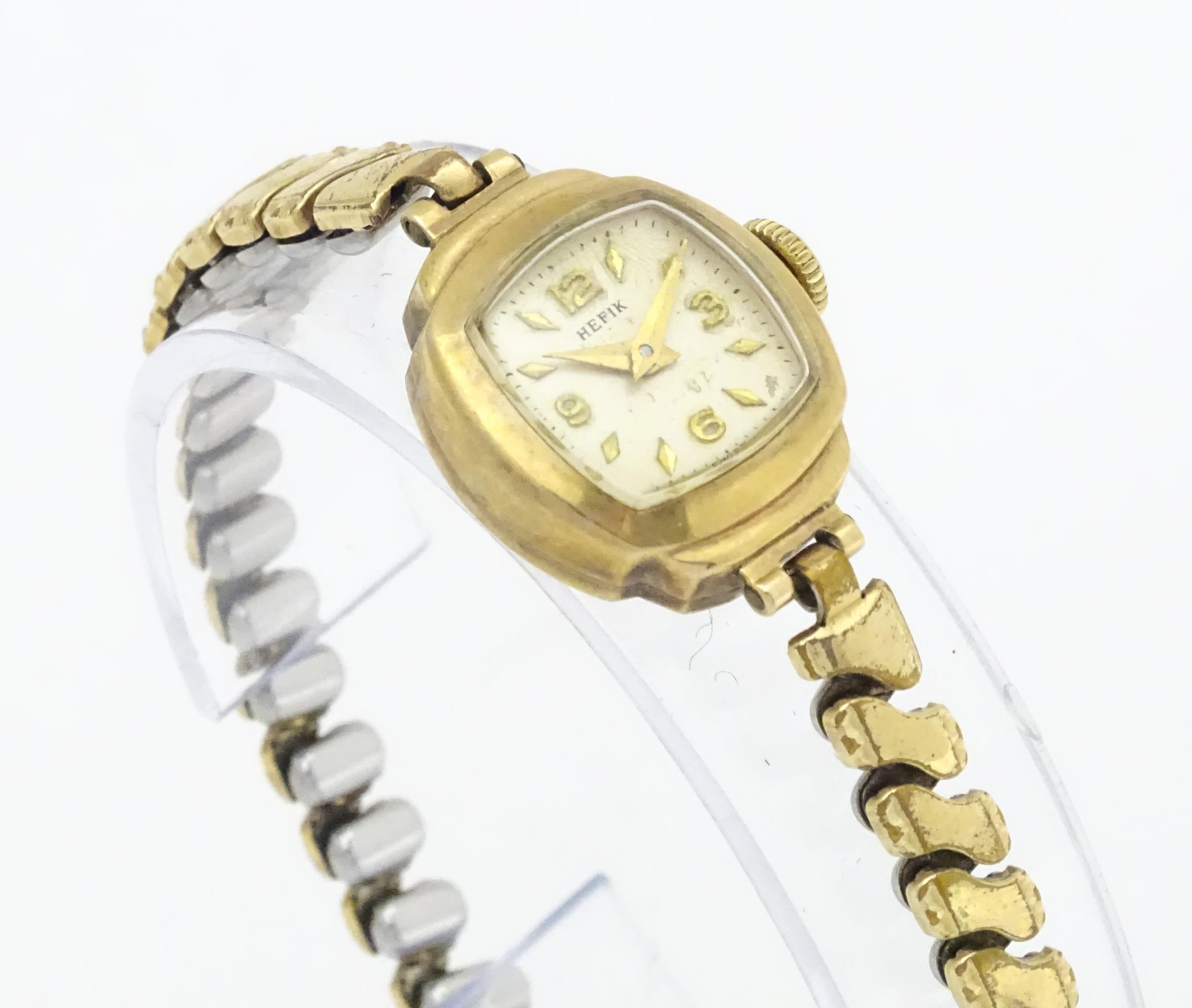 Three 9ct gold cases ladies wristwatches, to include a Hefik wrist watch with 9ct gold strap, - Image 4 of 14