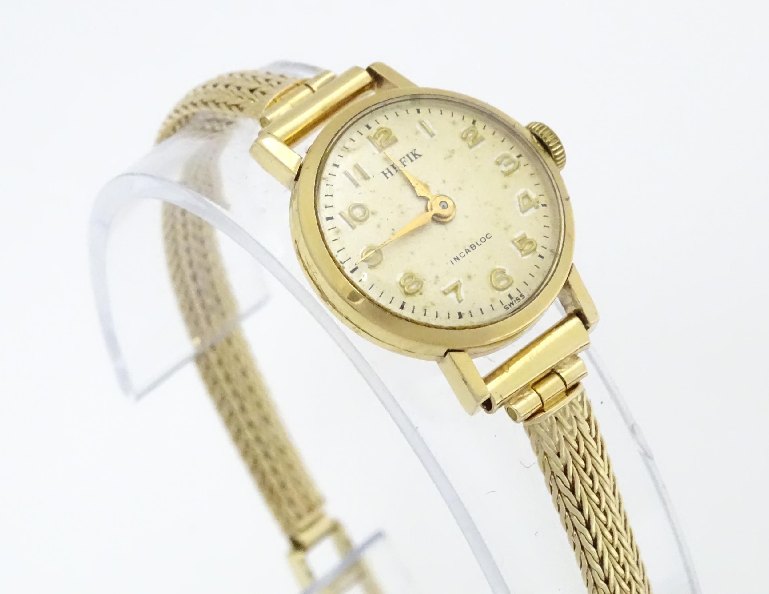 Three 9ct gold cases ladies wristwatches, to include a Hefik wrist watch with 9ct gold strap, - Image 3 of 14