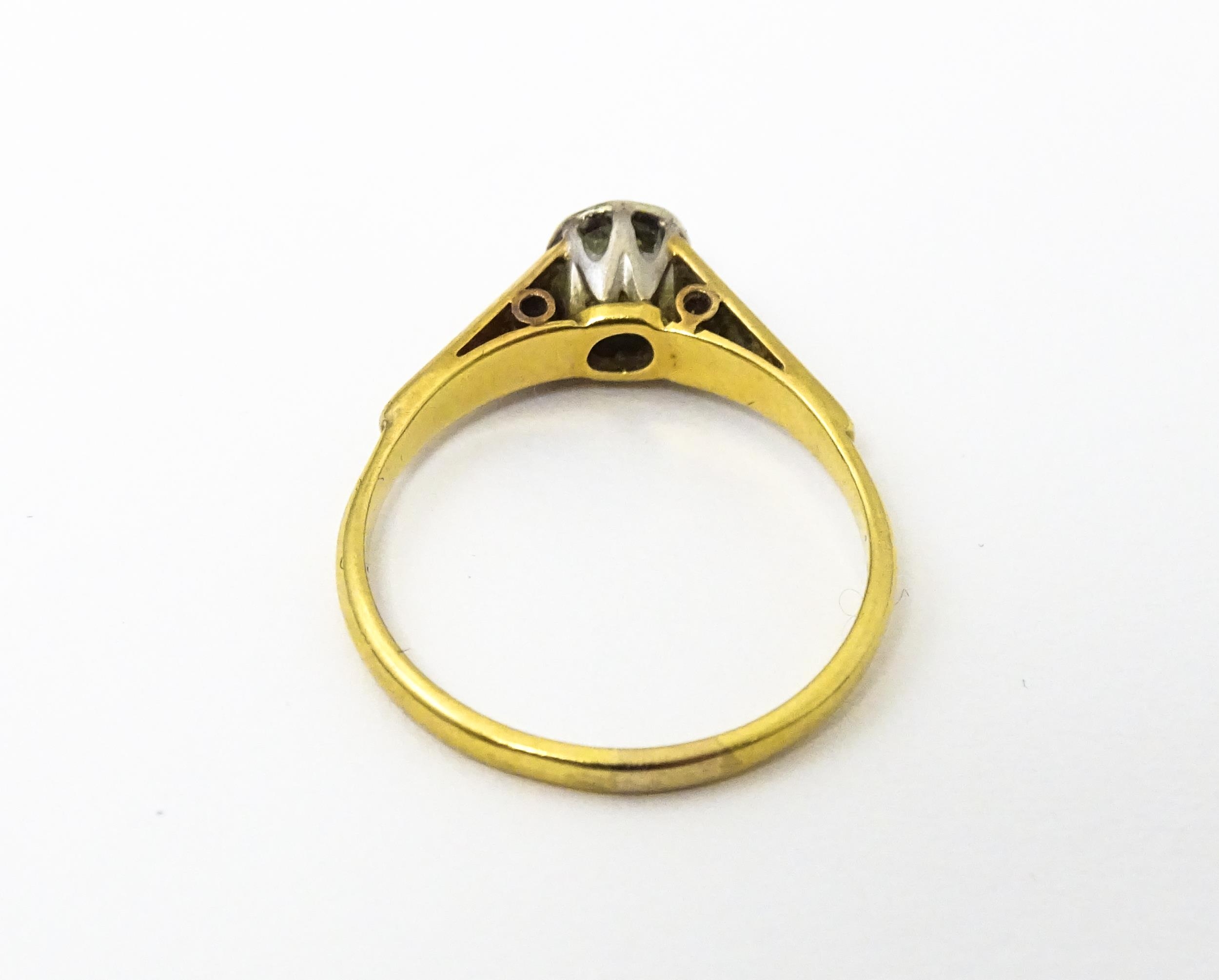 An 18ct gold ring with central illusion set diamond. Ring size approx O Please Note - we do not make - Image 5 of 7