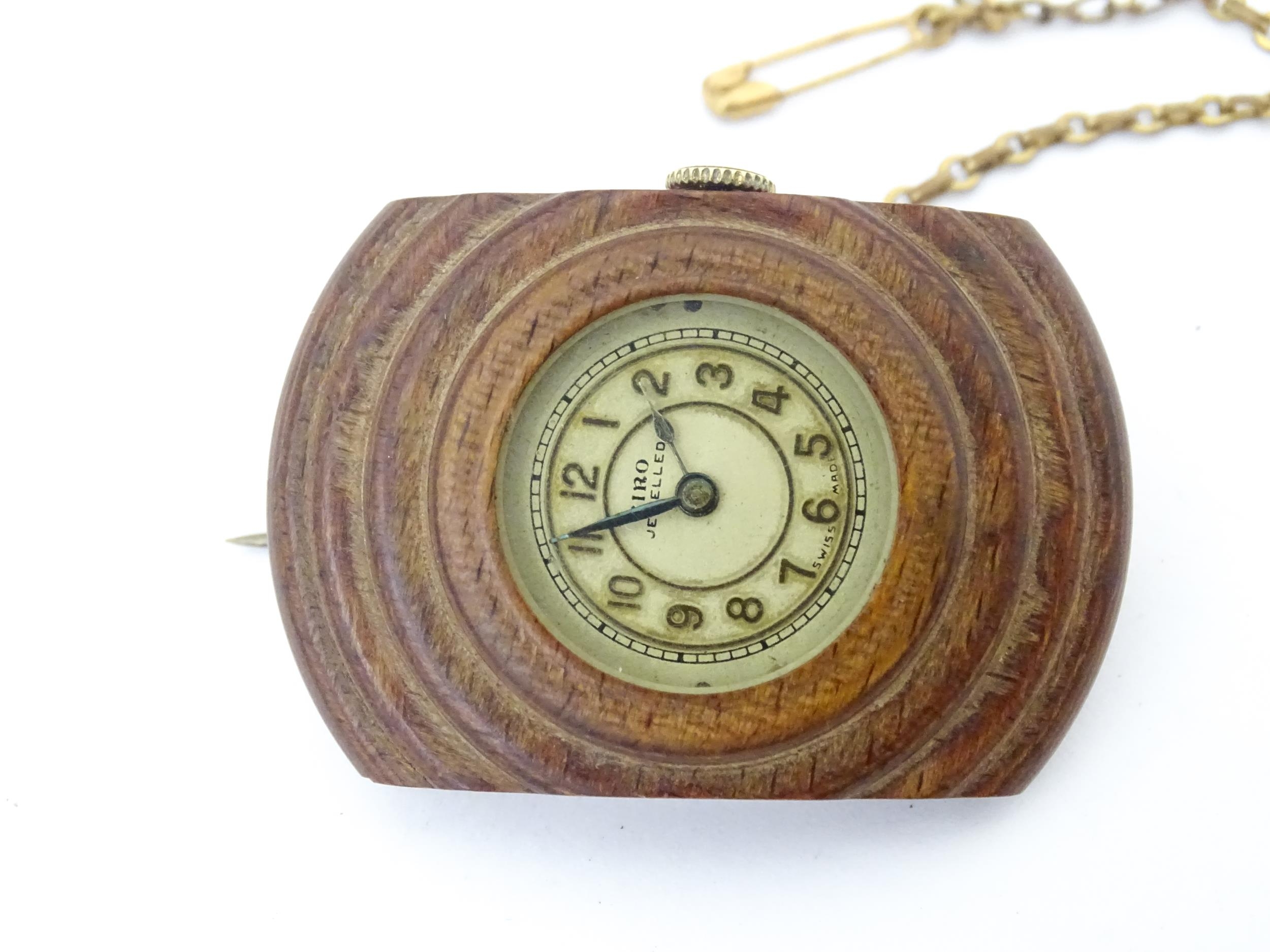 An unusual watch formed as a brooch, the Siro watch with 15 jewel movement mounted within a carved - Image 4 of 5