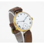 A 18ct gold cased gentlemans wristwatch, the white enamel dial with Roman numerals and subsidiary