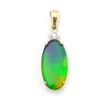 A 9ct gold pendant set with oval iridescent opal style ammolite opalescent cabochon, surmounted by a