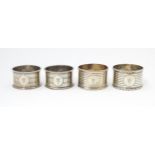 Two silver napkin rings hallmarked Birmingham 1918 maker Martin Hall & Co ltd. Together with two