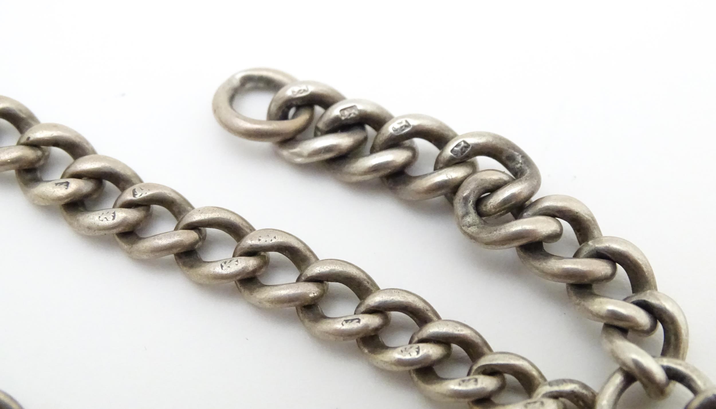 A silver pocket watch chain of graduated curblink form. Hallmarked Birmingham 1910. Approx 15" - Image 2 of 4
