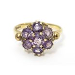 A 9ct gold ring set with with amethyst cluster. Ring size approx. L 1/2 Please Note - we do not make