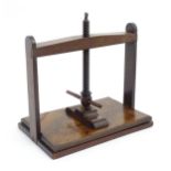 A 19thC mahogany table top book press. Approx. 14" high x 16" wide x 10 1/4" deep Please Note - we