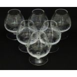 Six brandy glasses with etched sporting / wildlife scenes depicting running deer, hare, wild boar,