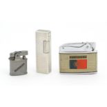 Three pocket lighters, comprising a cased Ronson Automatic with Portugal decoration, a miniature