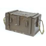 Militaria : a post-WWII wooden ammunition crate, the interior with base sections to fit eight jet