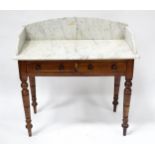 A late 19thC marble topped table wash stand, the base with two drawers, standing approx 36" wide,