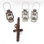 A quantity of paraffin / spirit lamps, together with wall mounted torch / candle stand Please Note -