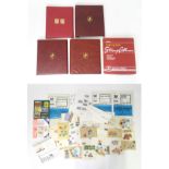 Four Stanley Gibbons stamp albums containing various late 20thC postage stamps for Great Britain and