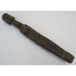Ethnographic / Native / Tribal: An African carved hardwood figure depicting an elongated woman