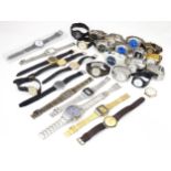 A large quantity of gents quartz wristwatches, etc. Please Note - we do not make reference to the