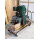 A Lister 1-1062 petrol stationary engine, Approx 25" tall, with trolley Please Note - we do not make