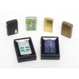 Six Zippo pocket lighters, comprising three graphic examples (two boxed), one in black finish, one