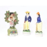 Three 20thC Staffordshire pottery figures, to include two cricketers and a figure titled Gardener (