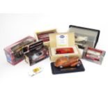 Toys : a quantity of boxed scale model cars / vehicles by Corgi and Burago etc, including a James