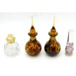 Four assorted glass scent / perfume bottles. The tallest approx. 6" high (4) Please Note - we do not