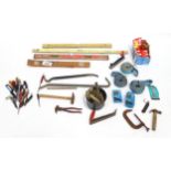 A quantity of tools, including spirit levels, hammer, rasp, crowbars, spanners, screwdrivers etc.