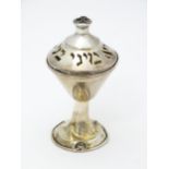 Judaica: A silver pedestal spice box with Hebrew script to lid. Approx. 3 1/2" high Please Note - we