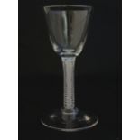 A 19thC pedestal drinking glass with twist detail to stem. Approx 4 1/4" high Please Note - we do