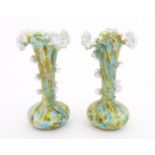 A pair of art glass vases with flared rims and prunt detail. Approx 9 1/2" high Please Note - we
