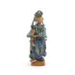 A Chinese Sancai style pottery figure holding a scroll. Approx. 13 1/4" high Please Note - we do not